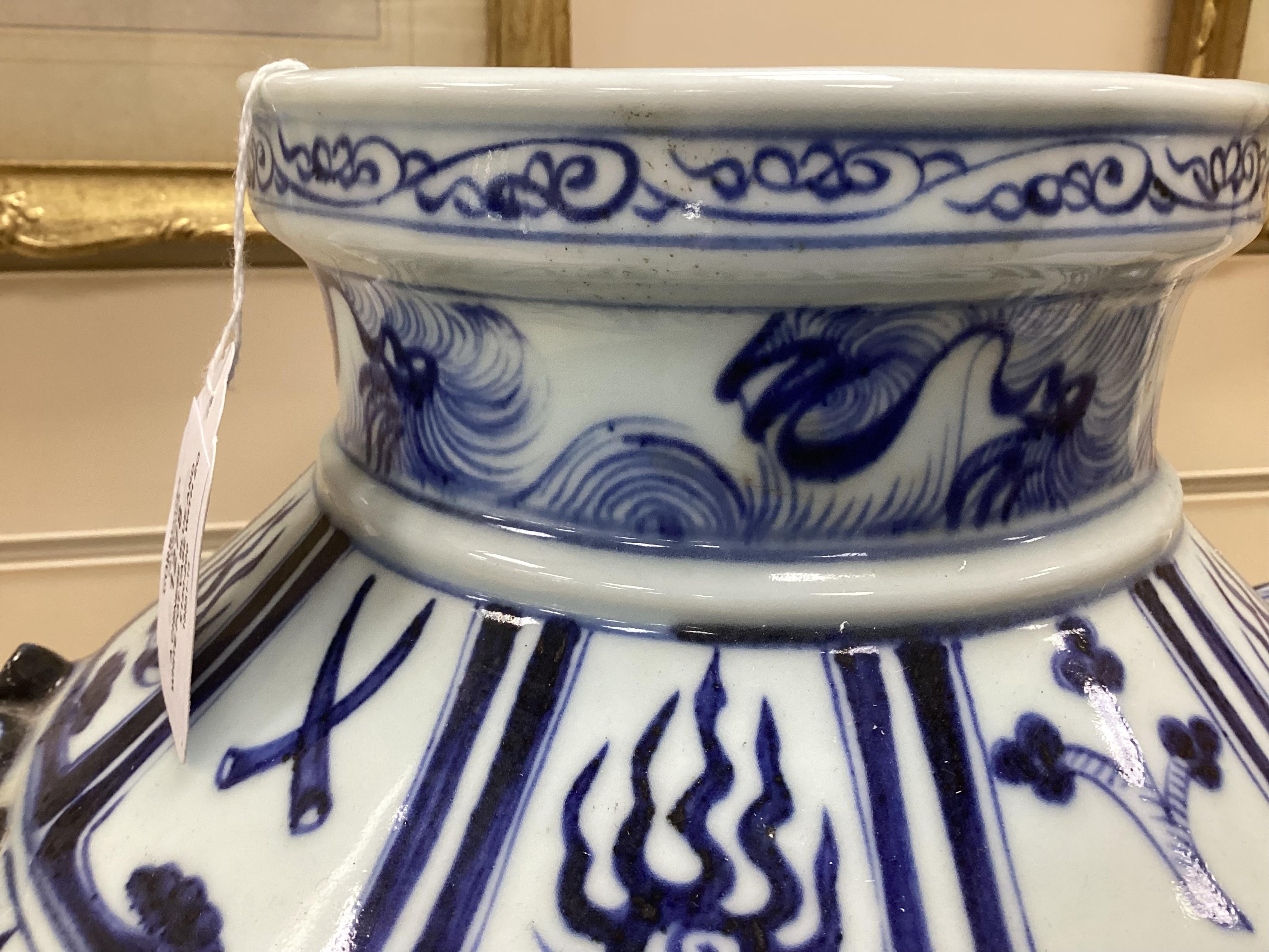 A Chinese blue and white pot vase with zoological handles, 38cm high